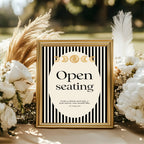 Black Celestial open seating sign in black and cream