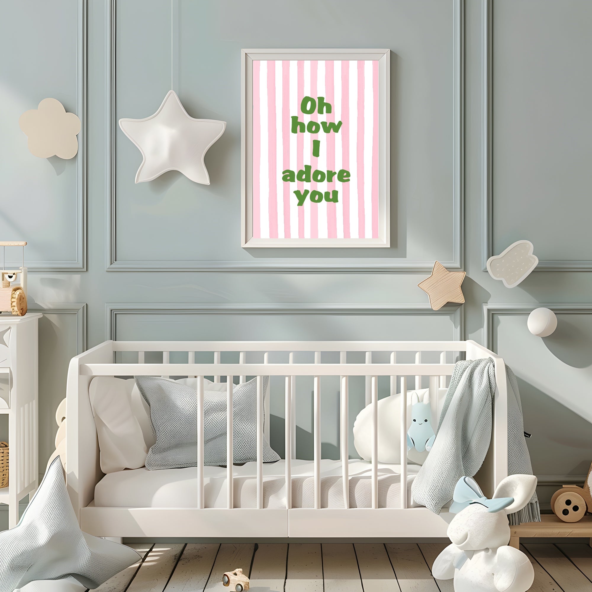 Nursery room with a white crib, decorative pillows, and a framed quote on a light blue wall.