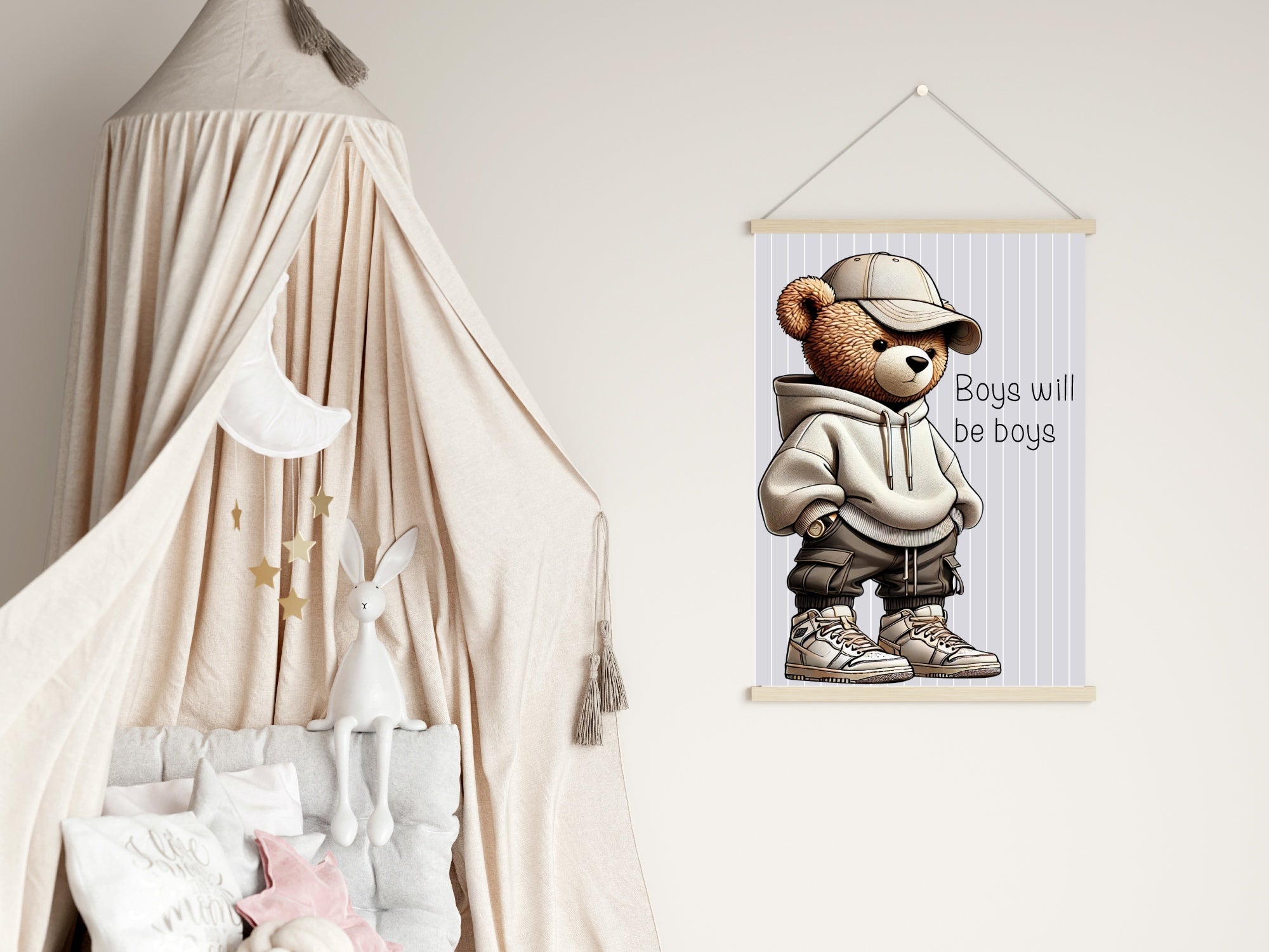Framed picture of a bear wearing a cap and hoodie with text in a child's room.