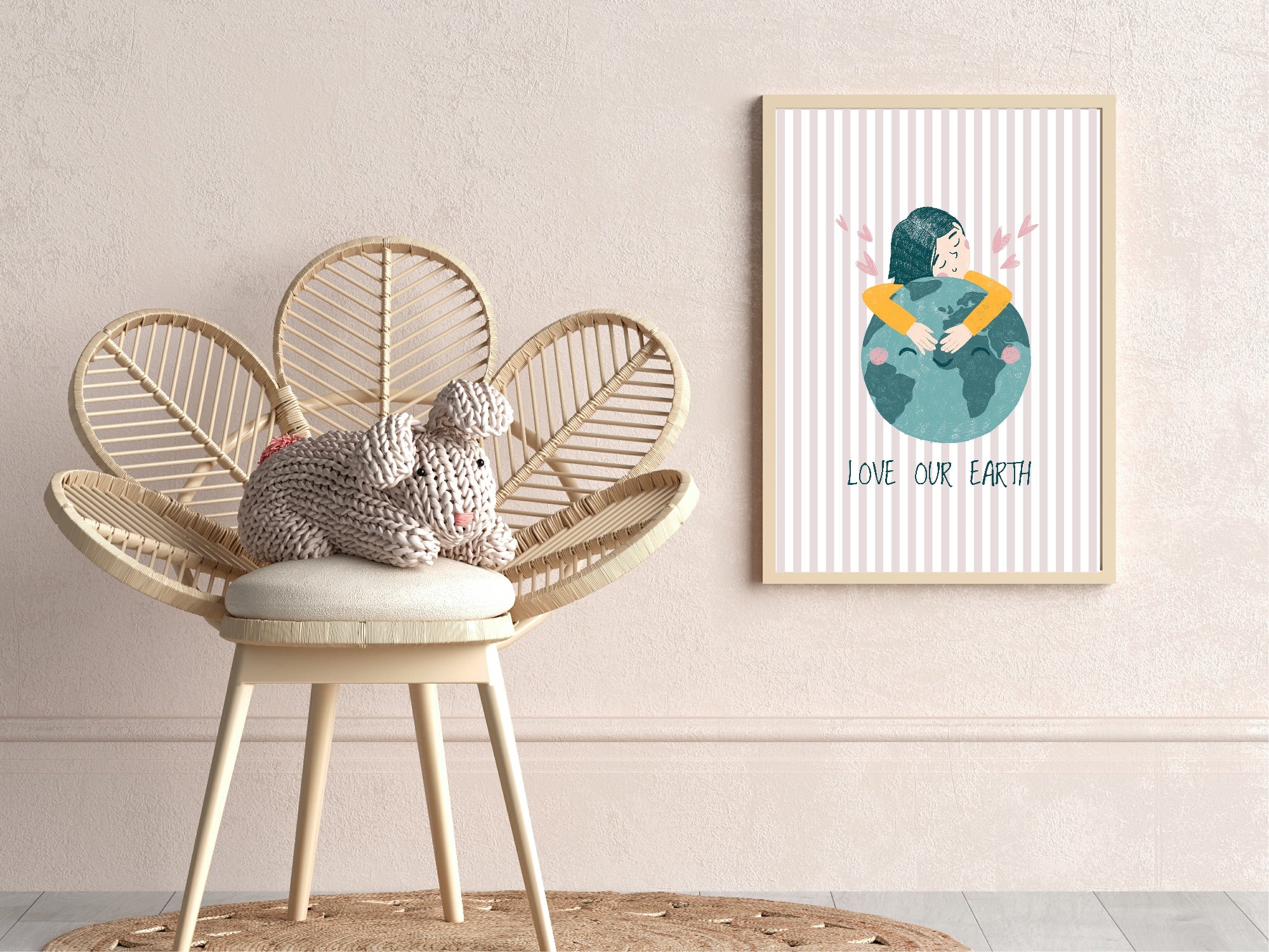 Wicker chair with a knitted item and a framed artwork on a wall.