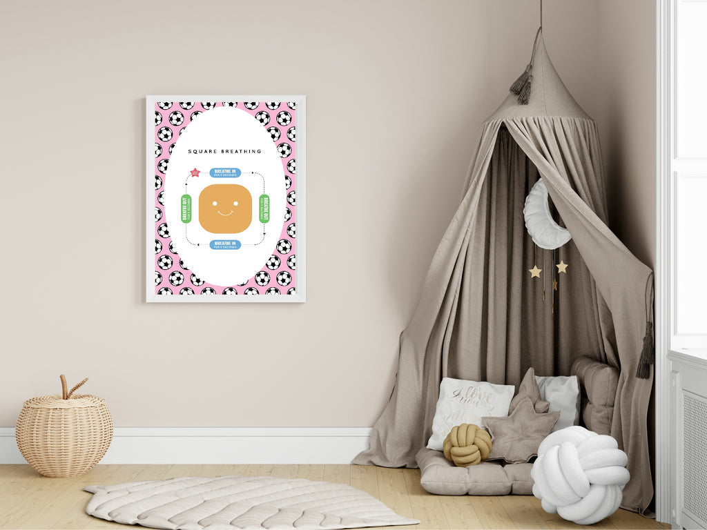 Children's room with a framed picture on the wall, a canopy bed, and decorative pillows.