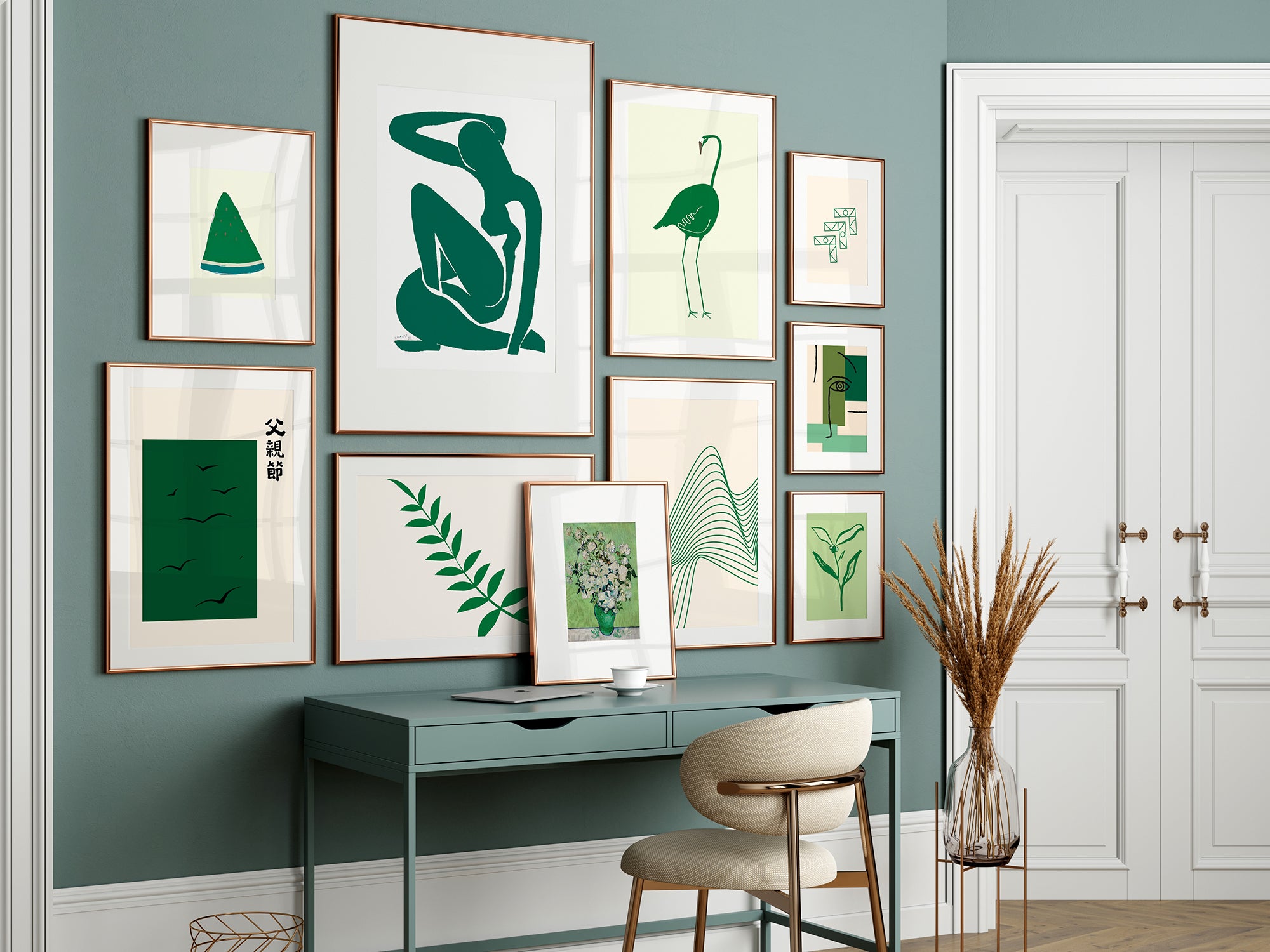 Green art prints on a wall in a home office setting