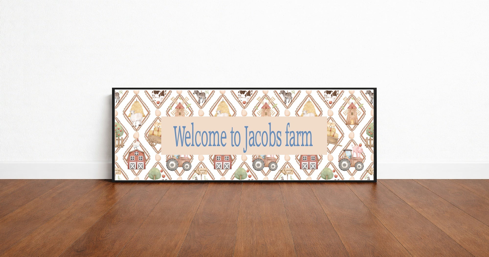 Decorative sign with 'Welcome to Jacobs farm' text on a wooden floor.