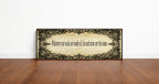 Black Lace Whatever Our Souls Are Made Of panoramic print in a black frame standing on a wooden floor