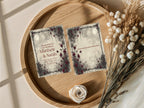 Moon and Rose wedding invitation front and quote reverse displayed on a wooden tray