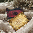 Red Spell Book wedding invitation front and red ornate reverse on lace